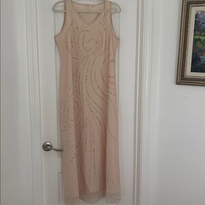 Elegant Beige Sleeveless Dress with Gold Accents